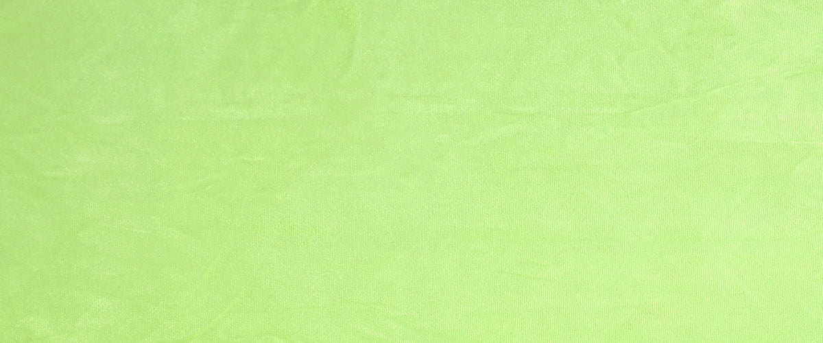Fabric close up. A lime green shown in a brighter light.
